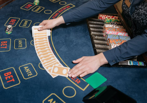 Hoeveel huisvoordeel heeft de banker-inzet bij baccarat met 5% commissie?